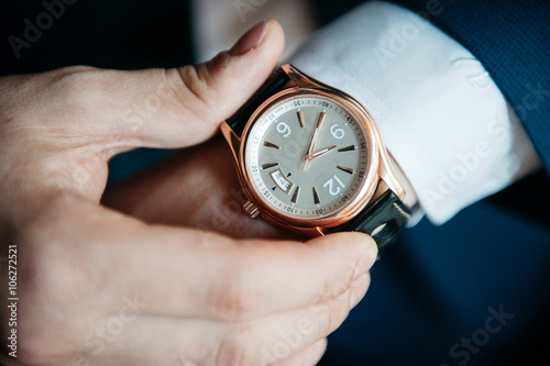 men's watch on his hand close-up