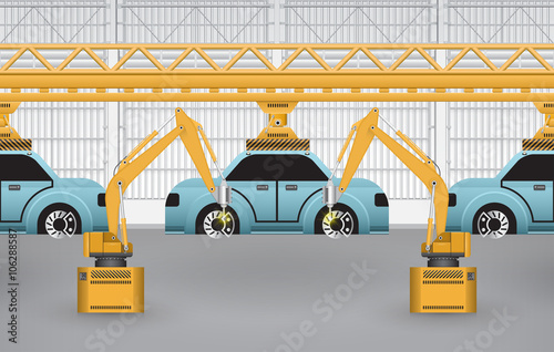 Robots working with auto parts in factory.