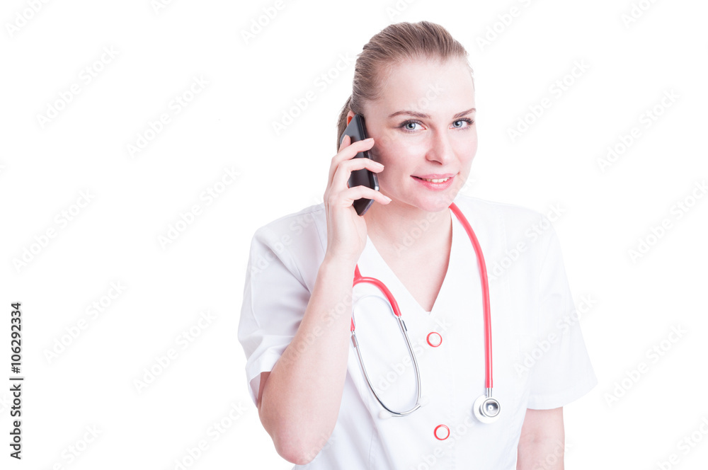 Friendly clinic contact woman holding mobile phone or cellphone Friendly clinic contact woman holding mobile phone or cellphone