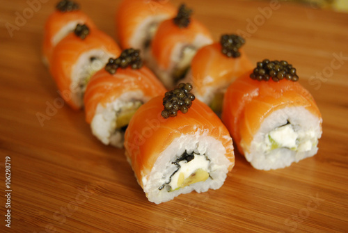 Sushi rolls Philadelphia with black caviar on top