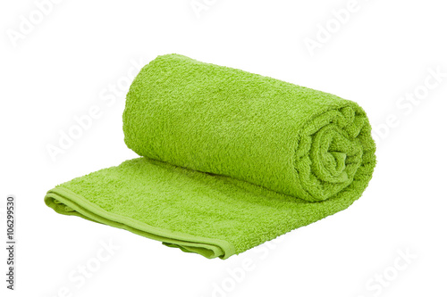 One green towel roll on a white background