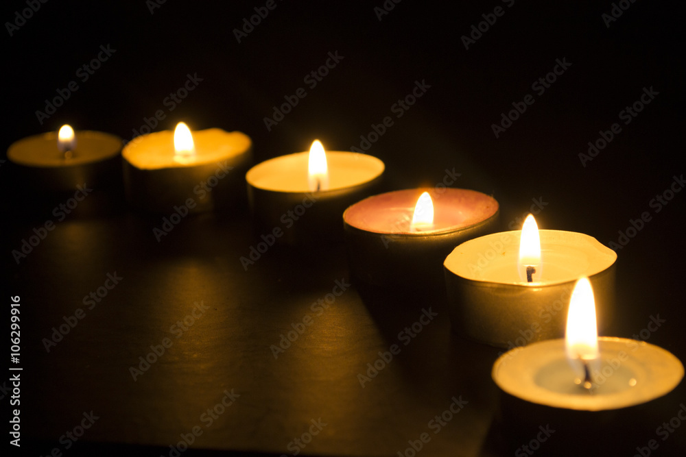 Burning candles in the dark
Burning candles in the dark