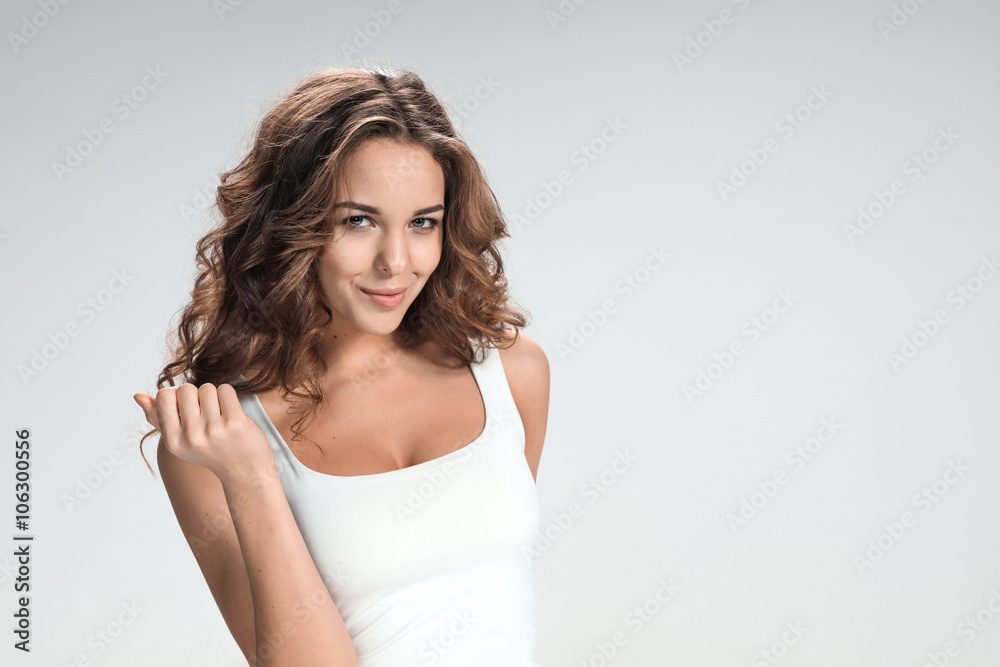 The young woman's portrait with happy emotions The young woman's portrait with happy emotions