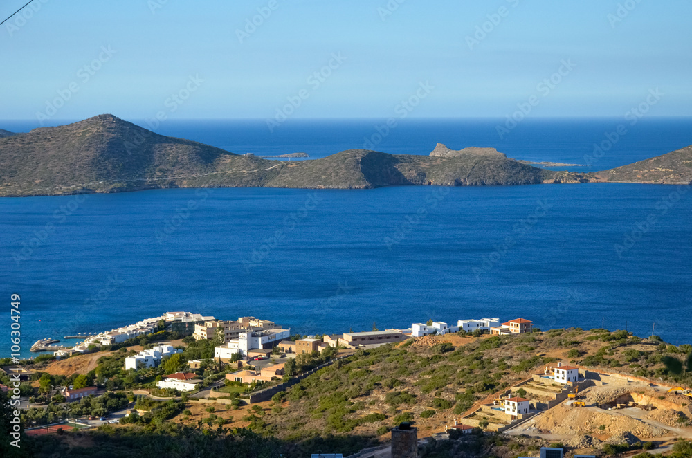 scenic skyline with mountains in the background of blue sea in greece on the island of Crete