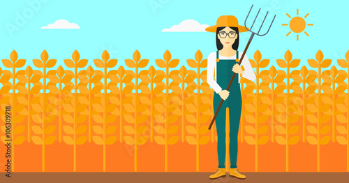 Farmer with pitchfork.