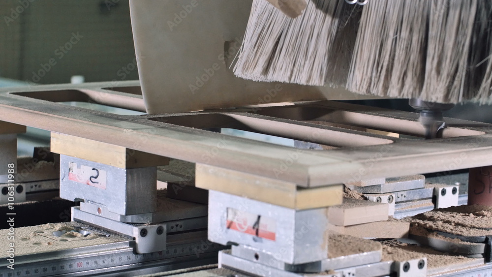 Automatic milling cutting wood machine. drill bit mill grooves, curved surfaces and drill all the required holes for the pieces of wood Automatic milling cutting wood machine. drill bit mill grooves, curved surfaces and drill all the required holes for the pieces of wood