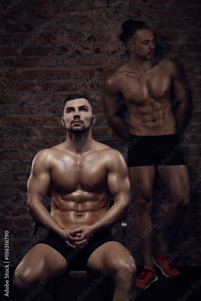 Two young muscular men