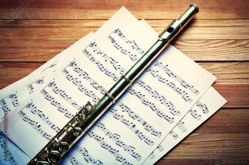 Flute on musical notes and ...