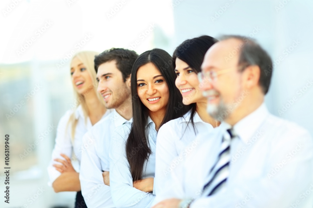 successful and happy business team on office background