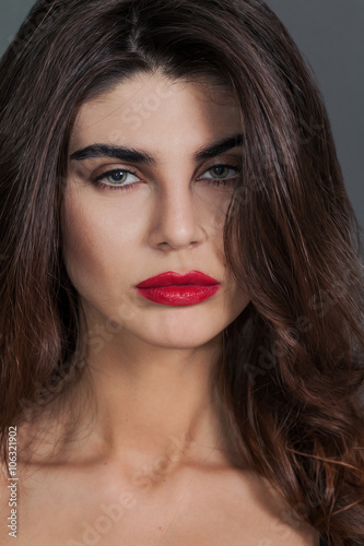 Beautiful woman portrait wearing red lipstick