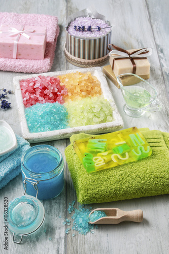 Colorful spa cosmetics on wooden table