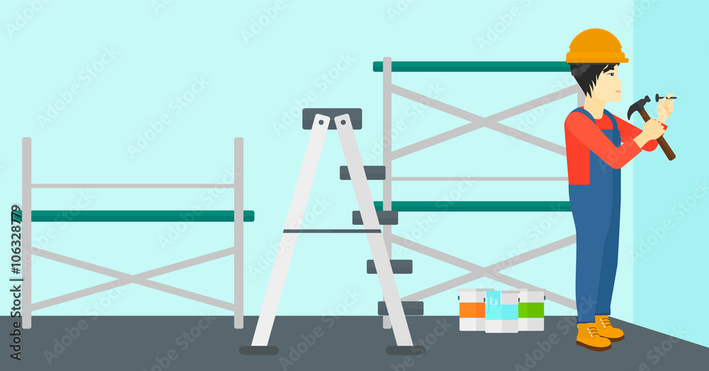 Constructor hammering nail. Constructor hammering nail.