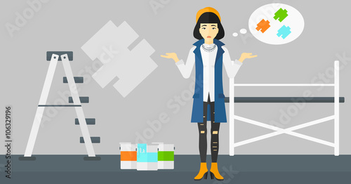 Woman choosing paint color.