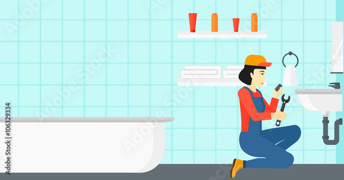 Woman repairing sink.