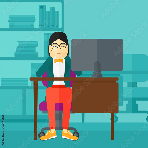 Tired employee sitting in office.