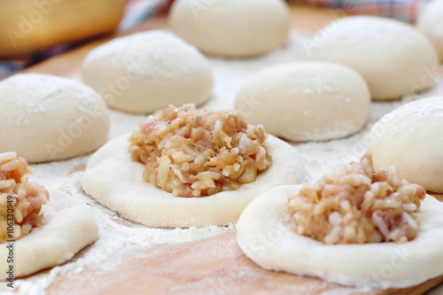 Preparing food. Dough and mince.