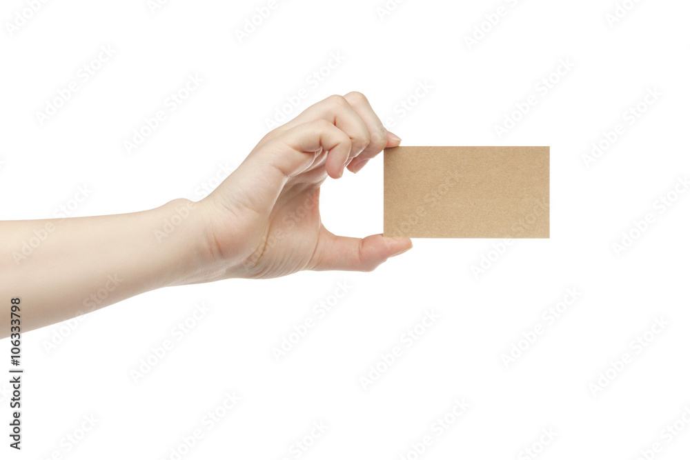 young female right hand hold blank brown paper card, isolated on white young female right hand hold blank brown paper card, isolated on white
