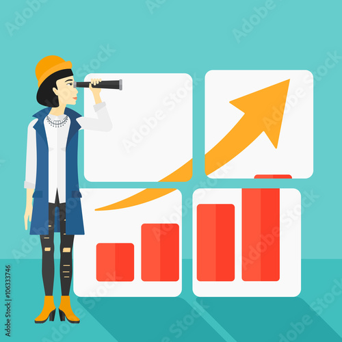Woman looking at positive bar chart.
