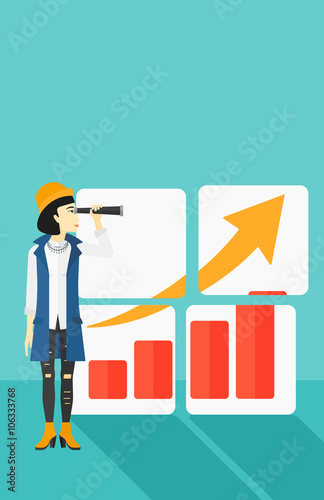Woman looking at positive bar chart.