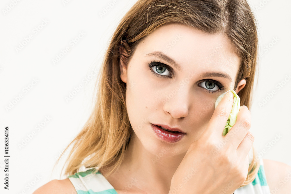 Sad woman with tissues on white background Sad woman with tissues on white background