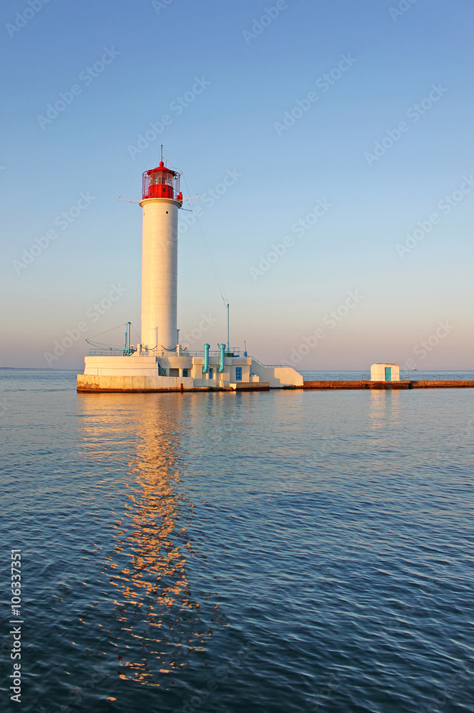 Operating lighthouse in Odessa. Ukraine in the evening. Black sea