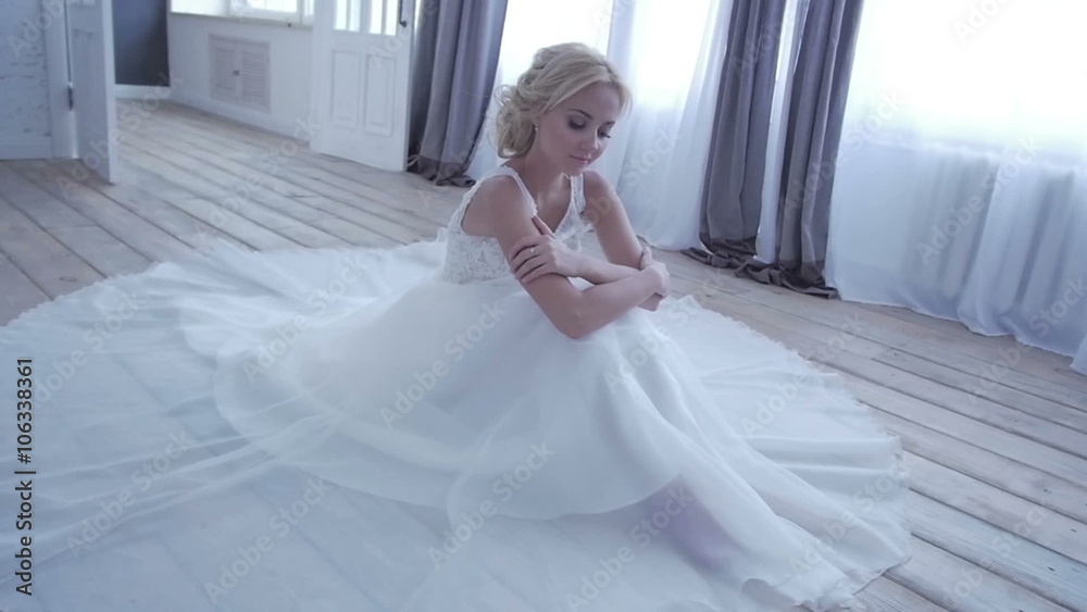 Beautiful bride posing in her wedding dress Beautiful bride posing in her wedding dress