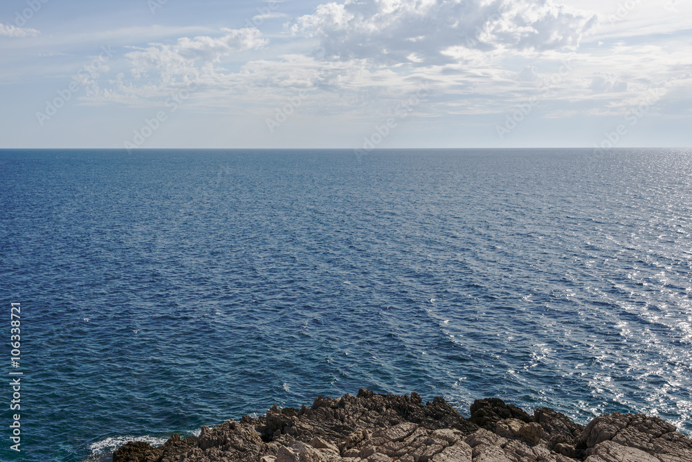 Sea calm surface and blue cloud sky. Horizon. Bay Gertsegnovska in Adriatic