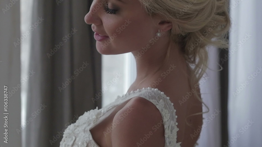Beautiful bride posing in her wedding dress Beautiful bride posing in her wedding dress