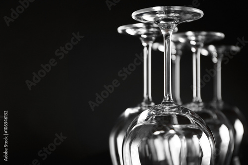 Empty wine glasses on dark background, closeup