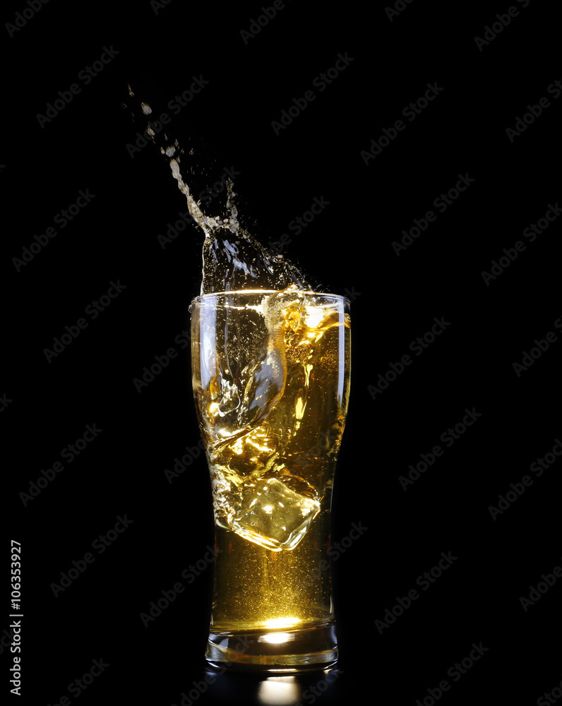 Glass of beer on black background Glass of beer on black background