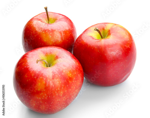 Pile of red juicy apples isolated on white background