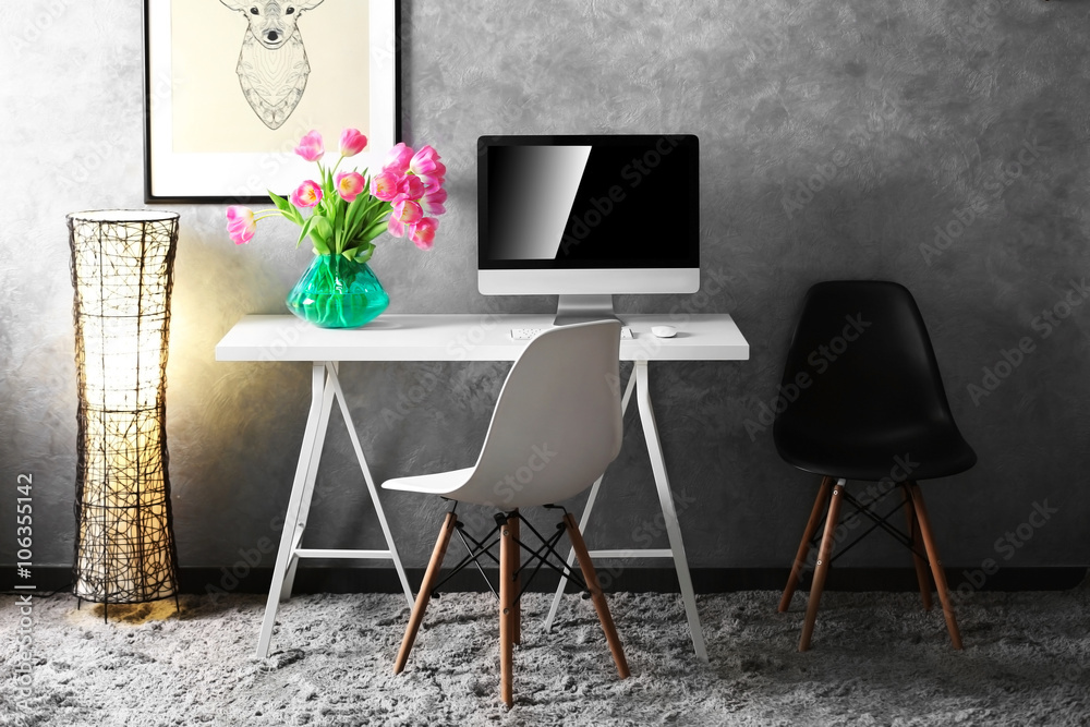 Fototapeta premium Stylish working place with computer and wooden table.