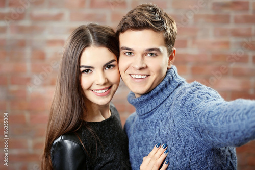 Teenager couple making phot...