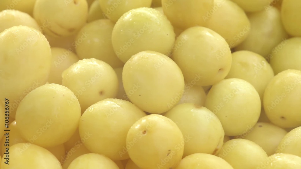 Yellow cherry plums with waterdrops rotation Yellow cherry plums with waterdrops rotation