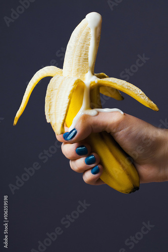 peeled banana ejaculates with yogurt