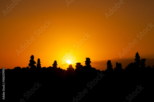 Sunset with stone piles Tenerife