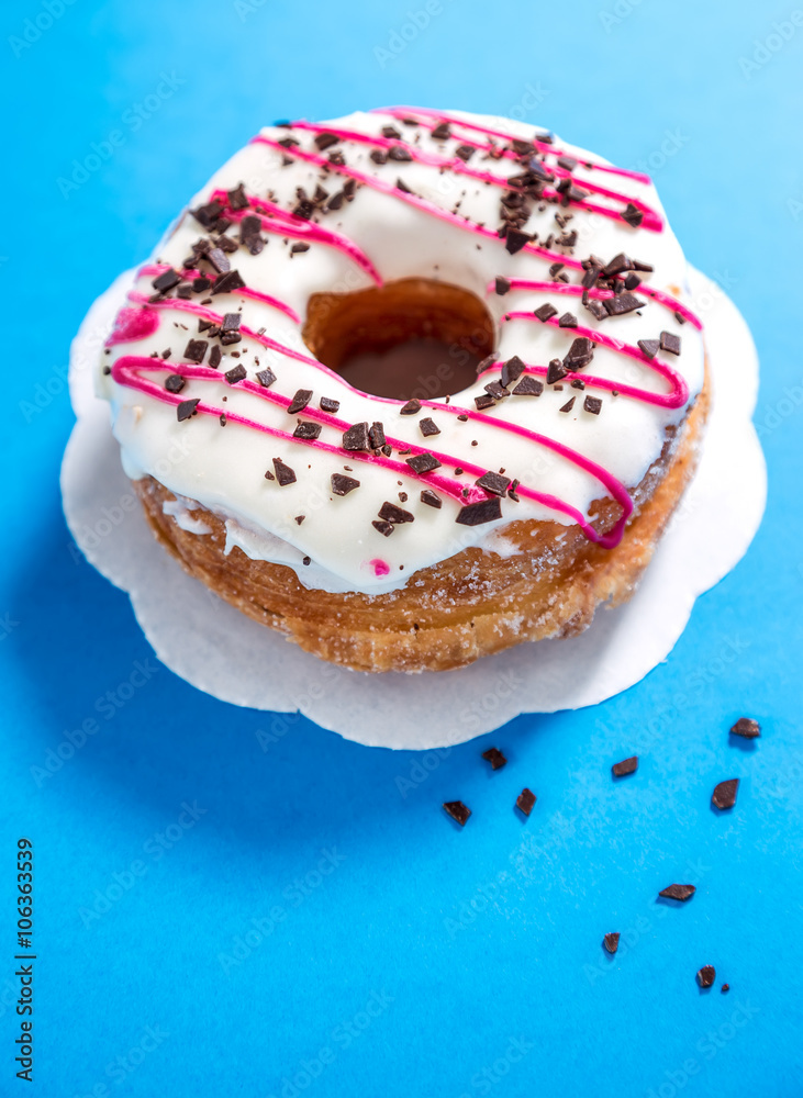 Glazed donut with chocolate pieces Glazed donut with chocolate pieces
