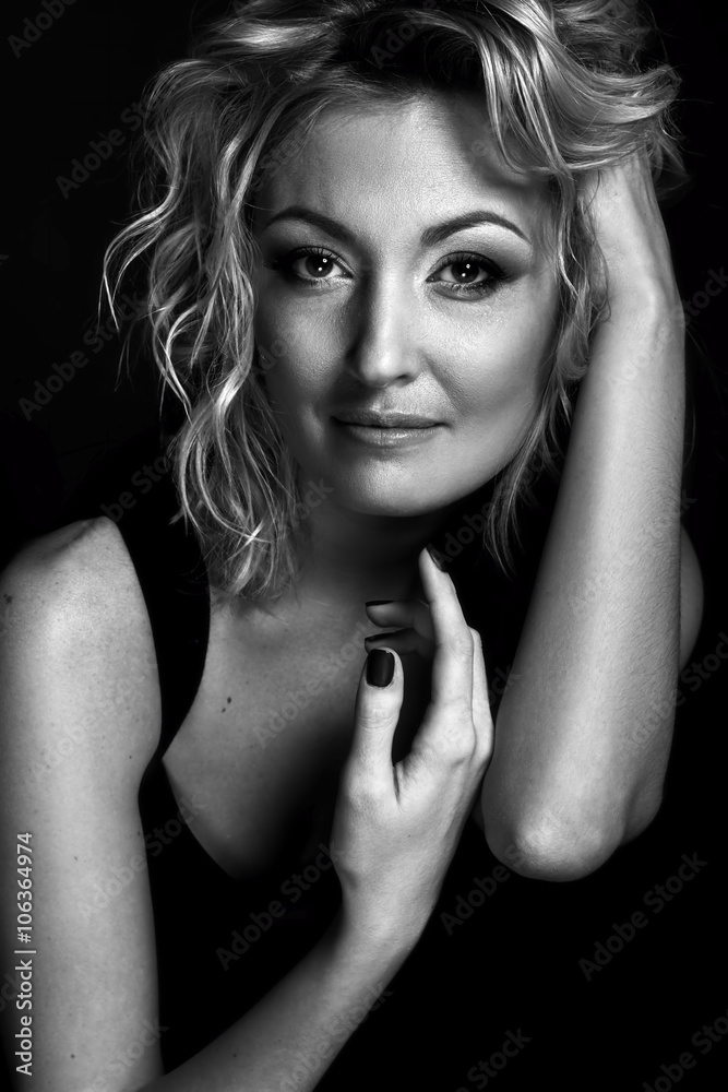 Blond sensual romantic woman portrait, smiling, black white photo Blond sensual romantic woman portrait, smiling, black white photo