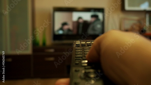 Watching TV-changing channels, remote rv