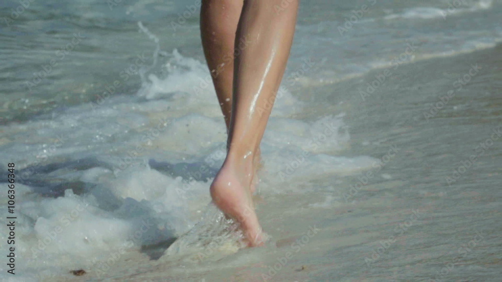 slow motion video of a woman running on beach barefoot at sunrise away from the camera. long shot.
slow motion video of a woman running on beach barefoot at sunrise away from the camera. long shot.