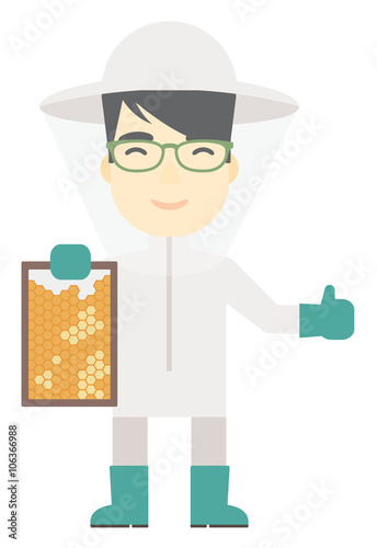 Bee-keeper at apiary.