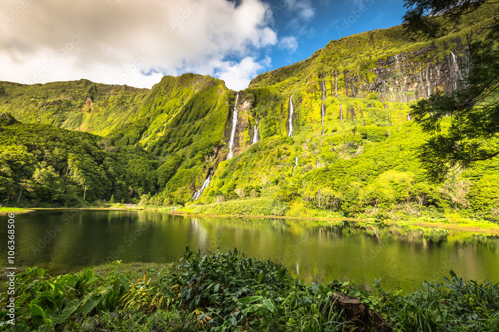 Azores landscape with waterfalls and cliffs in Flores island. Po
