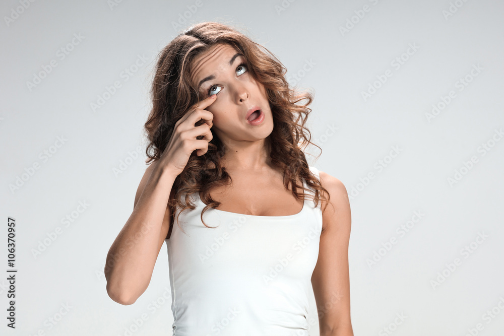 The young woman's portrait with bored emotions The young woman's portrait with bored emotions