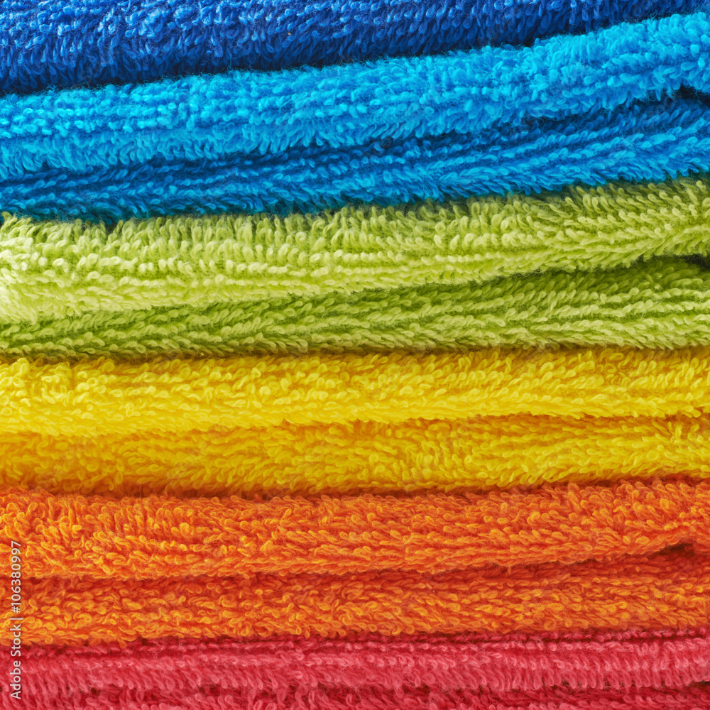 Pile of rainbow colored towels Pile of rainbow colored towels