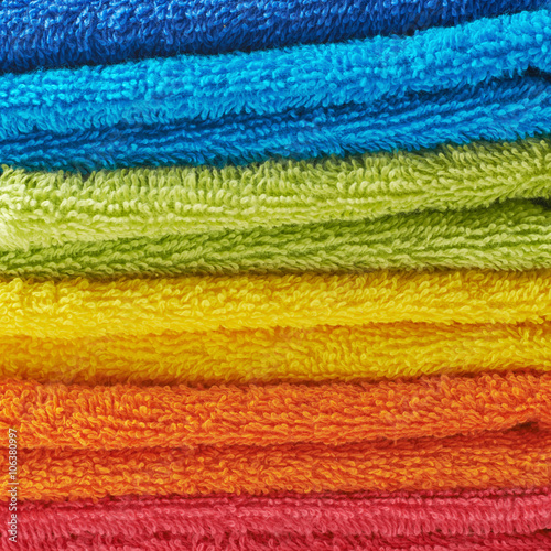 Pile of rainbow colored towels