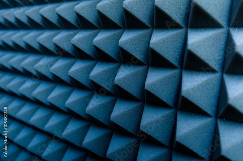 Dampening acoustical foam on recording studio wall © volf anders