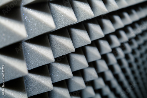 Dampening acoustical foam on recording studio wall