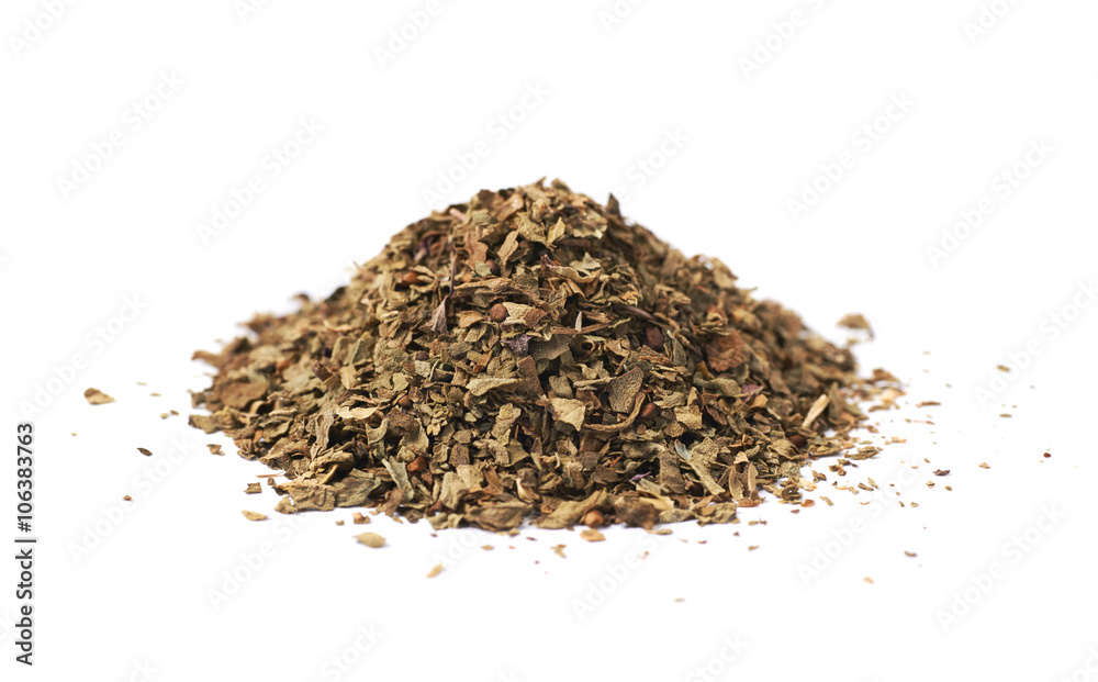 Pile of dried basil seasoning isolated Pile of dried basil seasoning isolated
