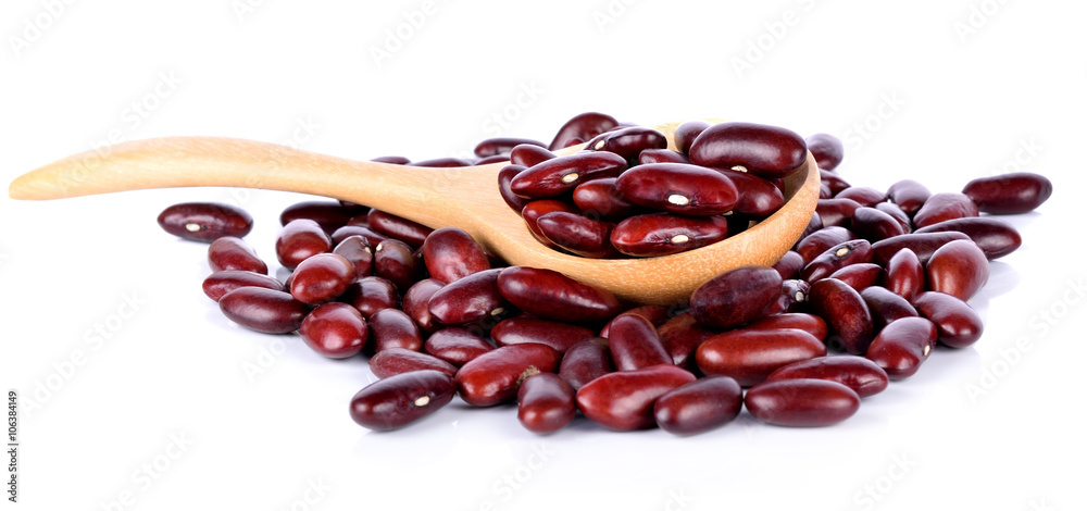 red beans in a spoon on the white background red beans in a spoon on the white background
