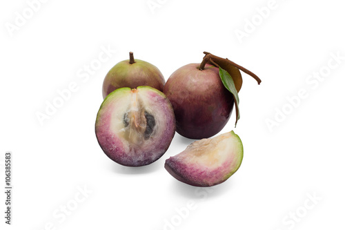 Star apple or cainito isolated on white background photo
